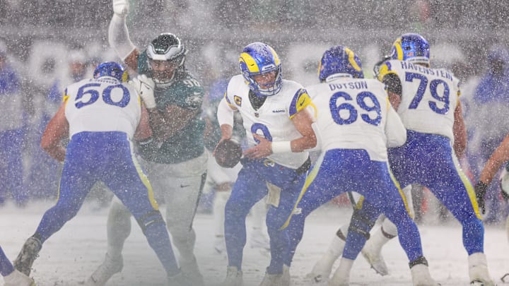 Jan 19, 2025; Philadelphia, Pennsylvania, USA; Los Angeles Rams quarterback Matthew Stafford (9) in action against the Philadelphia Eagles in a 2025 NFC divisional round game at Lincoln Financial Field. Mandatory Credit: Bill Streicher-Imagn Images
