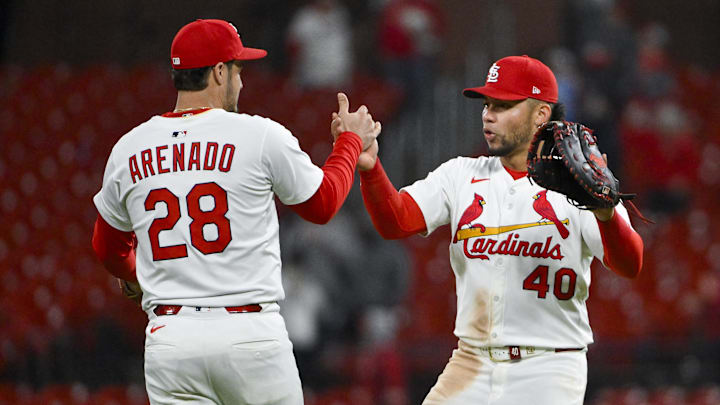 May 5, 2025; St. Louis, Missouri, USA;  St. Louis Cardinals first baseman Willson Contreras (40) celebrates with third baseman Nolan Arenado (28) after the Cardinals defeated the Pittsburgh Pirates at Busch Stadium. Mandatory Credit: Jeff Curry-Imagn Images