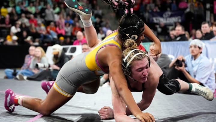 Southeast Polk’s Skylar Slade wrestles Algona’s Regan Jensen in a Class 2A 155-pound final Feb. 6, 2026 during the IGHSAU State Wrestling Championship at Xtream Arena in Coralville, Iowa.