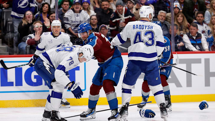 Oct 30, 2024; Denver, Colorado, USA; Tampa Bay Lightning defenseman Emil Lilleberg (78) and Colorado Avalanche center Matt Stienburg (36) scuffle ahead of defenseman Darren Raddysh (43) and defenseman Oliver Kylington (58) in the second period at Ball Arena. Mandatory Credit: Isaiah J. Downing-Imagn Images