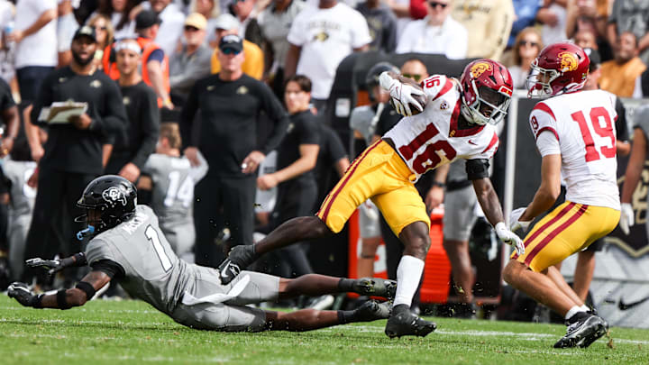 Sep 30, 2023; Boulder, Colorado, USA; USC Trojans wide receiver Tahj Washington (16) runs the ball
