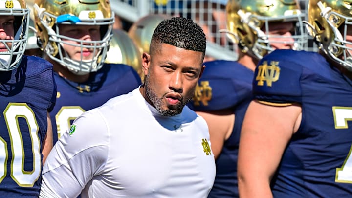 Sep 21, 2024; South Bend, Indiana, USA; Notre Dame Fighting Irish head coach Marcus Freeman prepares to lead his players onto the field for the game against the Miami Redhawks at Notre Dame Stadium. 