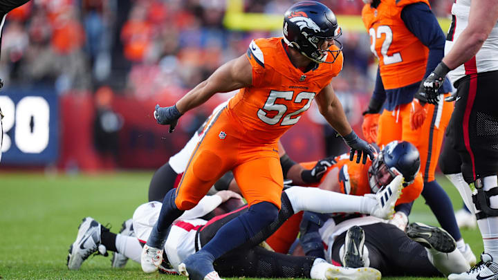 Nov 17, 2024; Denver, Colorado, USA; Denver Broncos linebacker Jonah Elliss (52) reacts after his sack in the second half against the Atlanta Falcons at Empower Field at Mile High. Mandatory Credit: Ron Chenoy-Imagn Images