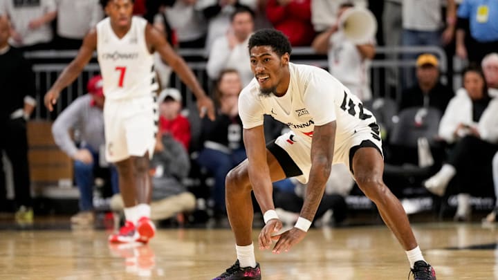 Cincinnati Bearcats guard Sencire Harris (5) defends the point in the second half of the NCAA Big 12 basketball game between the Cincinnati Bearcats and the Iowa State Cyclones at Fifth Third Stadium in Cincinnati on Saturday, Jan. 17, 2026. The Bearcats upset the No. 2 Cyclones, winning 79-70.