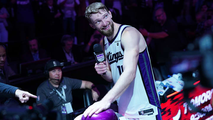 Apr 16, 2024; Sacramento, California, USA; Sacramento Kings forward Domantas Sabonis (10) lights the beam after the Kings defeated the Golden State Warriors during a play-in game of the 2024 NBA playoffs at the Golden 1 Center. Mandatory Credit: Cary Edmondson-Imagn Images