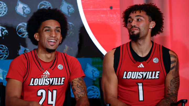 Louisville guard Chucky Hepburn (24) and guard/forward J'Vonne Hadley (1) at the ACC Basketball Tipoff Event in Charlotte, N.C