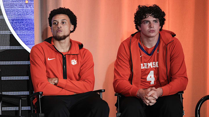 Oct 10, 2024; Charlotte, NC, USA; Clemson player Chad Hunter and Ian Schieffelin listen as their coach answers questions from the media at The Hilton Charlotte Uptown. Oct 10, 2024; Charlotte, NC, USA; Clemson player Chad Hunter and Ian Schieffelin listen as their coach answers questions from the media at The Hilton Charlotte Uptown.