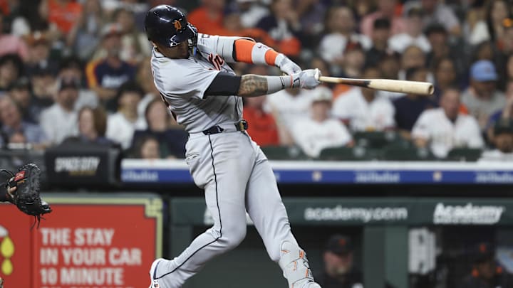 Apr 28, 2025; Houston, Texas, USA; Detroit Tigers center fielder Javier Baez (28) hits a double during the fifth inning against the Houston Astros at Daikin Park.