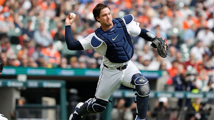 Apr 4, 2026; Detroit, Michigan, USA;  Detroit Tigers catcher Dillon Dingler (13) makes a throw to first in the second inning against the St. Louis Cardinals at Comerica Park. Mandatory Credit: Rick Osentoski-Imagn Images