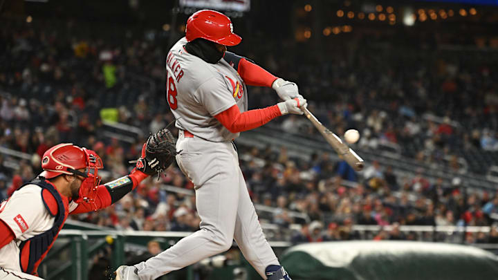 Apr 7, 2026; Washington, District of Columbia, USA; St. Louis Cardinals right fielder Jordan Walker (18) hits the ball into play against the Washington Nationals during the fifth inning at Nationals Park. Mandatory Credit: Rafael Suanes-Imagn Images