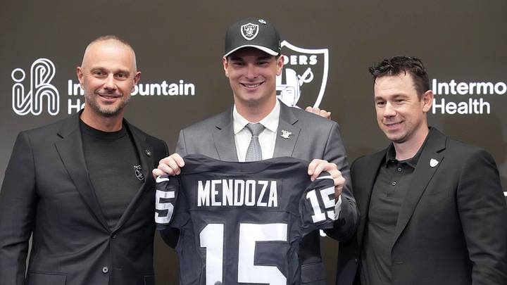 Apr 24, 2026; Henderson, NV, USA; Las Vegas Raiders quarterback Fernando Mendoza (center) poses with general manager John Spytek (left) and head coach Klint Kubiak at introductory press conference at Intermountain Health Performance Center after being selected as the No. 1 pick in the 2026 NFL Draft. Mandatory Credit: Kirby Lee-Imagn Images Apr 24, 2026; Henderson, NV, USA; Las Vegas Raiders quarterback Fernando Mendoza (center) poses with general manager John Spytek (left) and head coach Klint Kubiak at introductory press conference at Intermountain Health Performance Center after being selected as the No. 1 pick in the 2026 NFL Draft. Mandatory Credit: Kirby Lee-Imagn Images