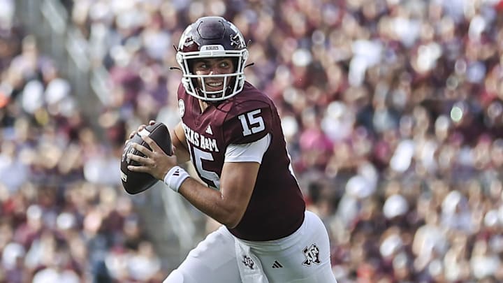 Sep 16, 2023; College Station, Texas, USA; Texas A&M Aggies quarterback Conner Weigman (15) rolls out of the pocket on a play during the second quarter against the Louisiana Monroe Warhawks at Kyle Field. Mandatory Credit: Troy Taormina-USA TODAY Sports