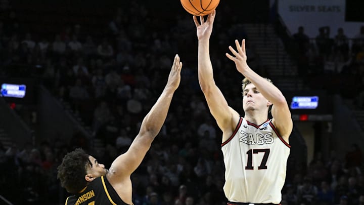 Mar 19, 2026; Portland, OR, USA; Gonzaga Bulldogs guard Mario Saint-Supery (17) shoots against Kennesaw State Owls guard RJ Johnson (11) during the second half of a first round game of the men's 2026 NCAA Tournament at Moda Center. Mar 19, 2026; Portland, OR, USA; Gonzaga Bulldogs guard Mario Saint-Supery (17) shoots against Kennesaw State Owls guard RJ Johnson (11) during the second half of a first round game of the men's 2026 NCAA Tournament at Moda Center.