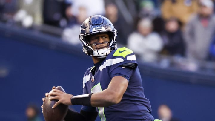 Nov 27, 2022; Seattle, Washington, USA; Seattle Seahawks quarterback Geno Smith (7) passes against the Las Vegas Raiders during the fourth quarter at Lumen Field. Mandatory Credit: Joe Nicholson-Imagn Images