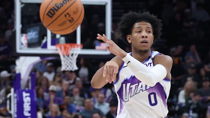 Mar 21, 2026; Salt Lake City, Utah, USA; Utah Jazz guard Kennedy Chandler (0) passes the ball against the Philadelphia 76ers during the second half at Delta Center. Mandatory Credit: Rob Gray-Imagn Images