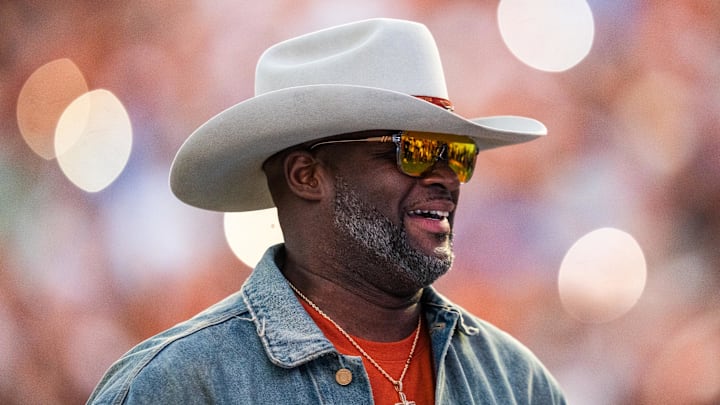 Nov 23, 2024; Austin, Texas, USA; Texas Longhorns former quarterback Vince Young takes the field during a timeout in the fourth quarter against the Kentucky Wildcats at Darrell K Royal Texas Memorial Stadium. Mandatory Credit: Sara Diggins/USA TODAY Network via Imagn Images Nov 23, 2024; Austin, Texas, USA; Texas Longhorns former quarterback Vince Young takes the field during a timeout in the fourth quarter against the Kentucky Wildcats at Darrell K Royal Texas Memorial Stadium. Mandatory Credit: Sara Diggins/USA TODAY Network via Imagn Images