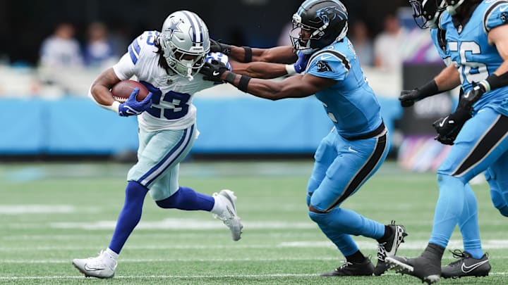 Dallas Cowboys running back Jaydon Blue runs with the ball during the second quarter against the Carolina Panthers.