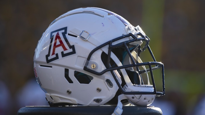 Nov 27, 2021; Tempe, Arizona, USA; Detailed view of an Arizona Wildcats helmet during the Territorial Cup at Sun Devil Stadium. Mandatory Credit: Mark J. Rebilas-Imagn Images Nov 27, 2021; Tempe, Arizona, USA; Detailed view of an Arizona Wildcats helmet during the Territorial Cup at Sun Devil Stadium. Mandatory Credit: Mark J. Rebilas-Imagn Images