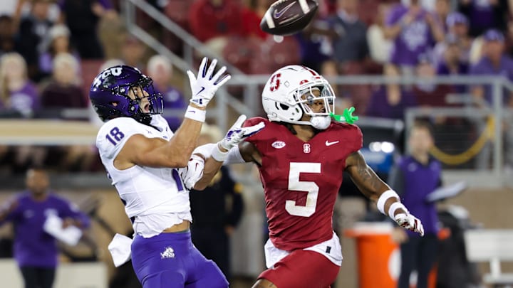 Aug 30, 2024; Stanford, California, USA; TCU Horned Frogs wide receiver Jack Bech (18) catches a pass against Stanford Cardinal safety Jay Green (5) during the second quarter at Stanford Stadium. Mandatory Credit: Sergio Estrada-Imagn Images