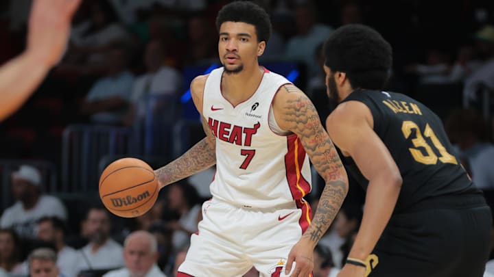 Apr 26, 2025; Miami, Florida, USA; Miami Heat center Kel'el Ware (7) dribbles the basketball as Cleveland Cavaliers center Jarrett Allen (31) defends in the third quarter during game three for the first round of the 2025 NBA Playoffs at Kaseya Center. Mandatory Credit: Sam Navarro-Imagn Images Apr 26, 2025; Miami, Florida, USA; Miami Heat center Kel'el Ware (7) dribbles the basketball as Cleveland Cavaliers center Jarrett Allen (31) defends in the third quarter during game three for the first round of the 2025 NBA Playoffs at Kaseya Center. Mandatory Credit: Sam Navarro-Imagn Images
