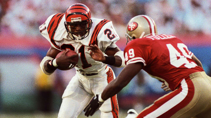 Jan 22, 1989; Miami, FL, USA; FILE PHOTO; Cincinnati Bengals running back James Brooks (21) carries the ball against San Francisco 49ers safety Jeff Fuller (49) during Super Bowl XXIII at Joe Robbie Stadium. The 49ers defeated the Bengals 20-16. Mandatory Credit: RVR Photos-Imagn Images