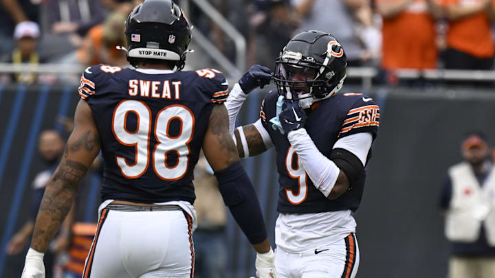 Sep 29, 2024; Chicago, Illinois, USA;  Chicago Bears safety Jaquan Brisker (9) celebrates with defensive end Montez Sweat (98) after Brisker sacked Los Angeles Rams quarterback Matthew Stafford (9) during the second half at Soldier Field. Mandatory Credit: Matt Marton-Imagn Images