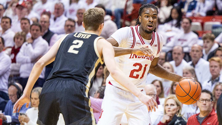 Indiana Hoosiers forward Mackenzie Mgbako (21) dribbles the ball while Purdue Boilermakers guard Fletcher Loyer (2) defends in the first half at Simon Skjodt Assembly Hall.
