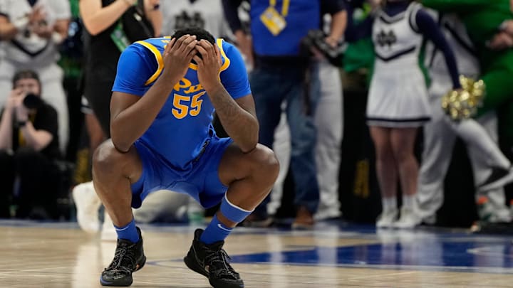 Mar 11, 2025; Charlotte, NC, USA; Pittsburgh Panthers forward Zack Austin (55) reacts after the loss at Spectrum Center. Mandatory Credit: Bob Donnan-Imagn Images