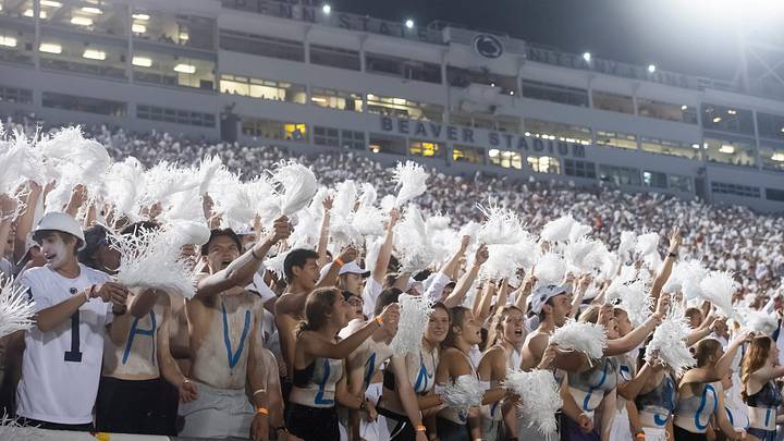 Penn State fans celebrate after the Nittany Lions score a touchdown. Penn State fans celebrate after the Nittany Lions score a touchdown.