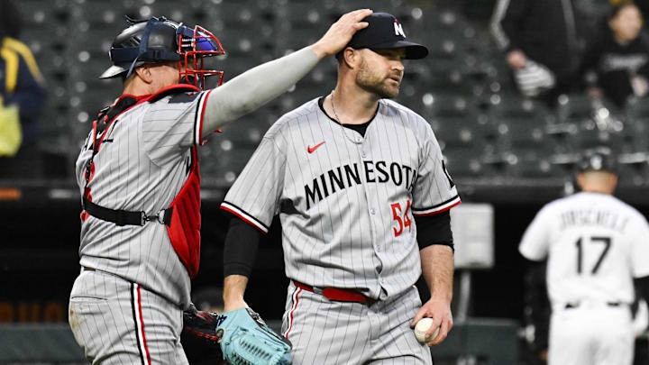 Apr 2, 2025; Chicago, Illinois, USA;  Minnesota Twins catcher Christian Vazquez (8) and pitcher Danny Coulombe (54) after a game against the Chicago White Sox at Guaranteed Rate Field. Mandatory Credit: Matt Marton-Imagn Images