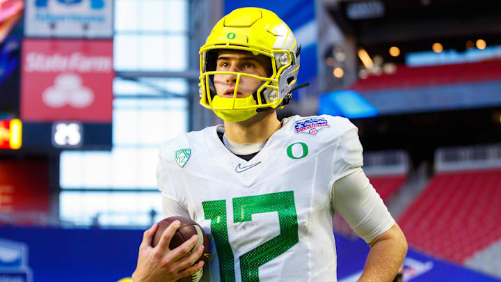 Jan 2, 2021; Glendale, AZ, USA; Oregon Ducks quarterback Tyler Shough (12) against the Iowa State Cyclones in the Fiesta Bowl at State Farm Stadium. Mandatory Credit: Mark J. Rebilas-Imagn Images