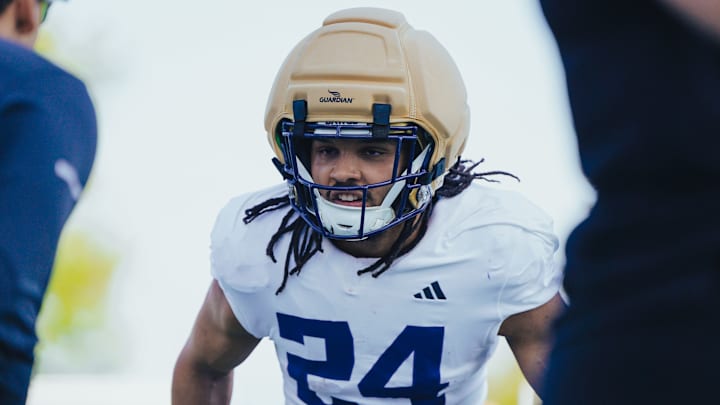 Makell Esteen waits for his turn in a UW spring drill.
