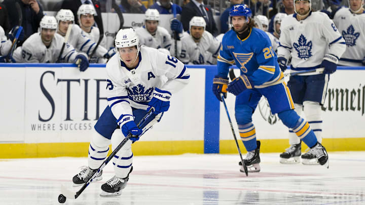 Nov 2, 2024; St. Louis, Missouri, USA;  Toronto Maple Leafs right wing Mitch Marner (16) controls the puck against the St. Louis Blues during the first period at Enterprise Center. Mandatory Credit: Jeff Curry-Imagn Images