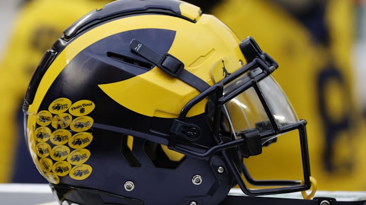 Apr 1, 2023; Ann Arbor, MI, USA; Michigan Wolverines helmet on the sideline during the Spring Game at Michigan Stadium. Apr 1, 2023; Ann Arbor, MI, USA; Michigan Wolverines helmet on the sideline during the Spring Game at Michigan Stadium.