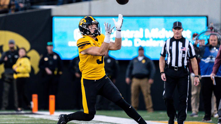 Iowa defensive back Cooper DeJean (3) catches a punt at Kinnick Stadium on Saturday, October 21,