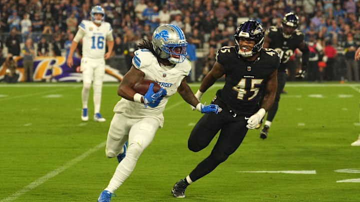 Detroit Lions running back Jahmyr Gibbs runs the ball against the Baltimore Ravens. 
