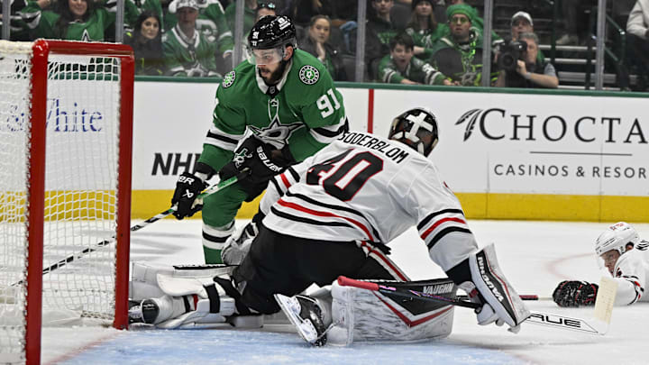 Nov 7, 2024; Dallas, Texas, USA; Chicago Blackhawks goaltender Arvid Soderblom (40) stops a short by Dallas Stars center Tyler Seguin (91) during the second period at the American Airlines Center. Mandatory Credit: Jerome Miron-Imagn Images Nov 7, 2024; Dallas, Texas, USA; Chicago Blackhawks goaltender Arvid Soderblom (40) stops a short by Dallas Stars center Tyler Seguin (91) during the second period at the American Airlines Center. Mandatory Credit: Jerome Miron-Imagn Images