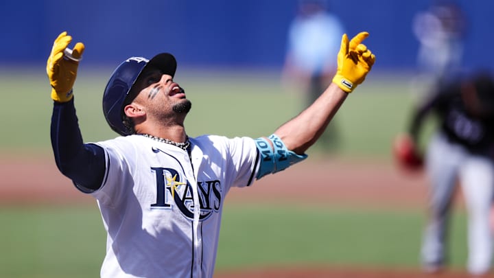 Tampa Bay Rays left fielder Christopher Morel (24) celebrates after hitting a three-run home run against the Miami Marlins. Tampa Bay Rays left fielder Christopher Morel (24) celebrates after hitting a three-run home run against the Miami Marlins.
