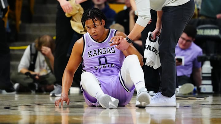 Feb 25, 2026; Boulder, Colorado, USA; Kansas State Wildcats forward Elias Rapieque (0) following an injury in the second half against the Colorado Buffaloes at the CU Events Center. Mandatory Credit: Ron Chenoy-Imagn Images
