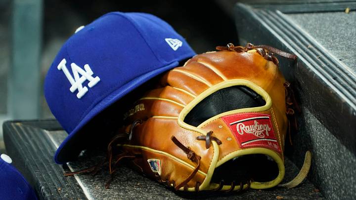 A hat and glove of an Los Angeles Dodgers player durng a game against the Toronto Blue Jays at Rogers Centre on April 28, 2024. A hat and glove of an Los Angeles Dodgers player durng a game against the Toronto Blue Jays at Rogers Centre on April 28, 2024.
