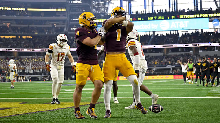 Arizona State Sun Devils wide receiver Xavier Guillory (1) and running back Cam Skattebo (4) celebrate a touchdown against the Iowa State Cyclones during the second half at AT&T Stadium. 