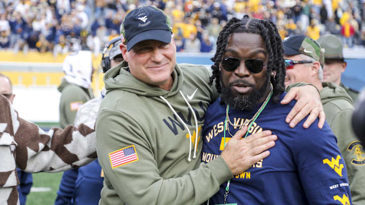 Nov 8, 2025; Morgantown, West Virginia, USA; West Virginia Mountaineers head coach Rich Rodriguez celebrates after defeating the Colorado Buffaloes at Milan Puskar Stadium. Mandatory Credit: Ben Queen-Imagn Images