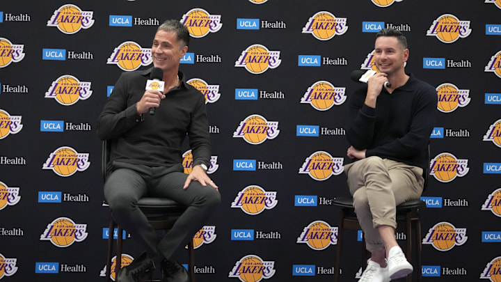 Sep 25, 2024; El Segundo, CA, USA; Los Angeles Lakers general manager Rob Pelinka (left) and coach JJ Redick at press conference at UCLA Health Training Center. Mandatory Credit: Kirby Lee-Imagn Images