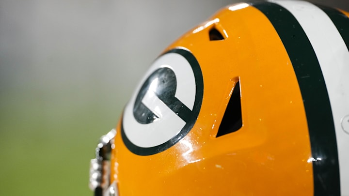 Nov 28, 2024; Green Bay, Wisconsin, USA; General view of a Green Bay Packers helmet during the game against the Miami Dolphins at Lambeau Field. Mandatory Credit: Jeff Hanisch-Imagn Images Nov 28, 2024; Green Bay, Wisconsin, USA; General view of a Green Bay Packers helmet during the game against the Miami Dolphins at Lambeau Field. Mandatory Credit: Jeff Hanisch-Imagn Images