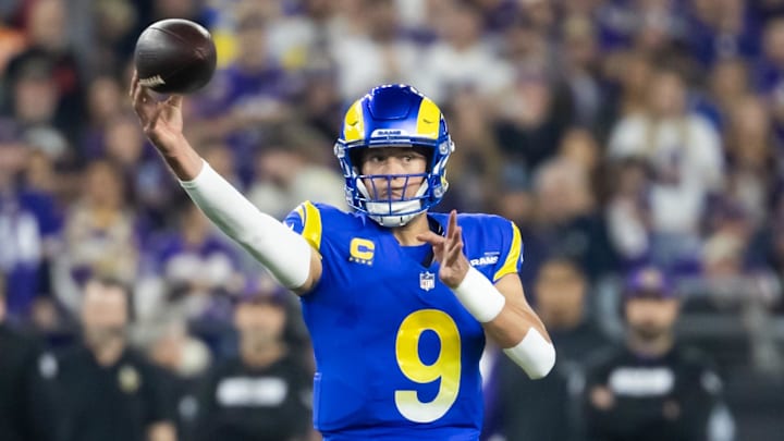 Jan 13, 2025; Glendale, AZ, USA; Los Angeles Rams quarterback Matthew Stafford (9) against the Minnesota Vikings during an NFC wild card game at State Farm Stadium. Mandatory Credit: Mark J. Rebilas-Imagn Images