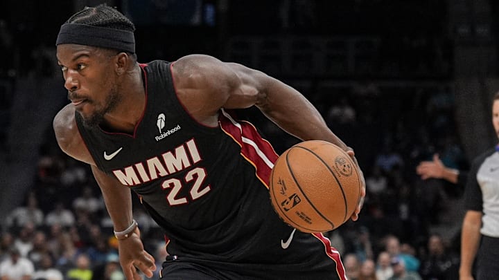 Oct 8, 2024; Charlotte, North Carolina, USA; Miami Heat forward Jimmy Butler (22) drives to the basket against the Charlotte Hornets during the second quarter at Spectrum Center. Mandatory Credit: Jim Dedmon-Imagn Images