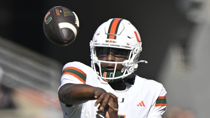 Oct 19, 2024; Louisville, Kentucky, USA; Miami Hurricanes quarterback Cam Ward (1) passes the ball against the Louisville Cardinals during the first half at L&N Federal Credit Union Stadium. Miami defeated Louisville 52-45. Mandatory Credit: Jamie Rhodes-Imagn Images Oct 19, 2024; Louisville, Kentucky, USA; Miami Hurricanes quarterback Cam Ward (1) passes the ball against the Louisville Cardinals during the first half at L&N Federal Credit Union Stadium. Miami defeated Louisville 52-45. Mandatory Credit: Jamie Rhodes-Imagn Images