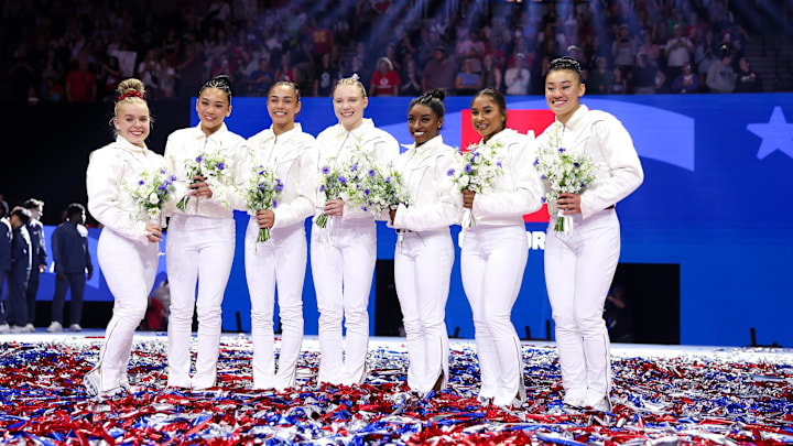 Jun 30, 2024; Minneapolis, Minnesota, USA; Joscelyn Roberson, Sunisa Lee, Hezly Rivera, Jade Carey, Simone Biles, Jordan Chiles and Leanne Wong pose for a photo after being selected for the 2024 U.S. Olympic Women's gymnastics team during the U.S. Olympic Team Gymnastics Trials at Target Center. Jun 30, 2024; Minneapolis, Minnesota, USA; Joscelyn Roberson, Sunisa Lee, Hezly Rivera, Jade Carey, Simone Biles, Jordan Chiles and Leanne Wong pose for a photo after being selected for the 2024 U.S. Olympic Women's gymnastics team during the U.S. Olympic Team Gymnastics Trials at Target Center.