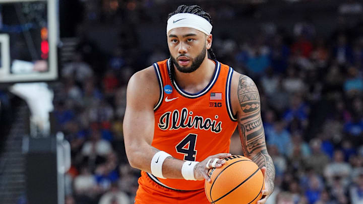 Mar 21, 2026; Greenville, SC, USA; Illinois Fighting Illini guard Kylan Boswell (4) controls the ball during the first half against the VCU Rams in a second-round game of the NCAA Tournament.