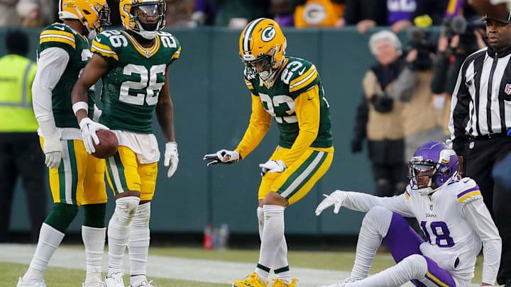 Green Bay Packers Jaire Alexander celebrates after breaking up a pass to Minnesota Vikings star Justin Jefferson.